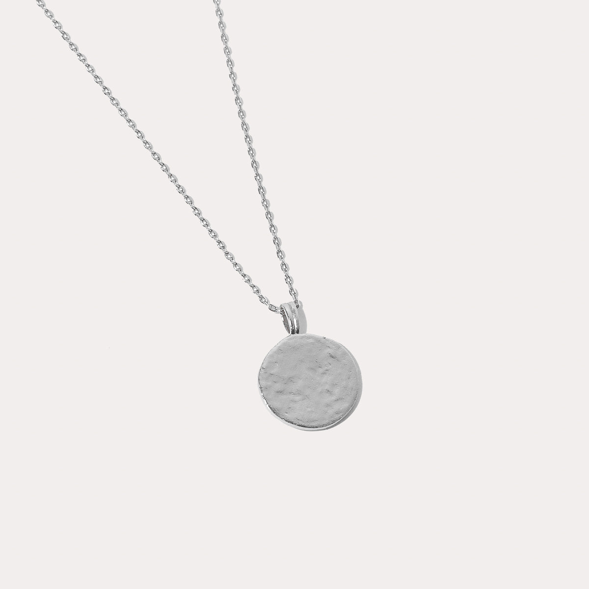 Close up shot of the back of the Pisces Zodiac Pendant Necklace in Silver