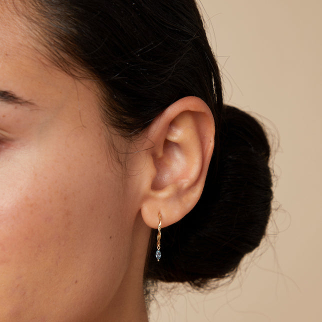 Earrings - Alexandrite Charm Twist Huggies in Solid Gold - Huggies - Astrid &amp; Miyu