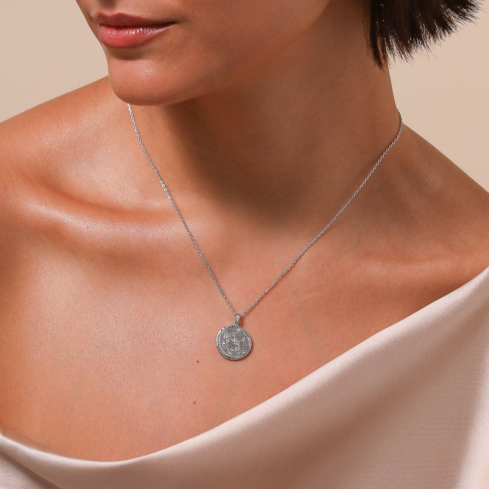 Aquarius Zodiac Pendant Necklace in Silver worn